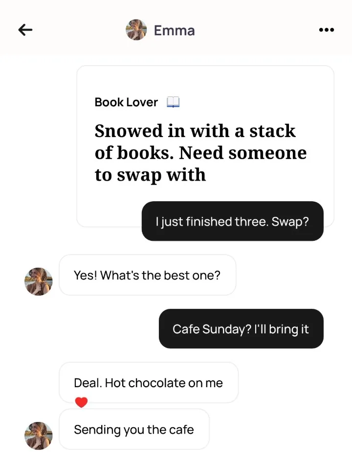An Alyke chat with Emma that opens under her Book Lover card, Snowed in with a stack of books, and goes from I just finished three. Swap? to a cafe on Sunday with hot chocolate on her