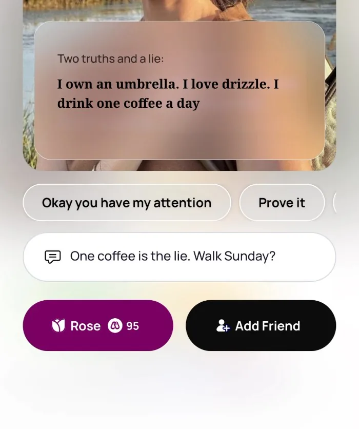 Replying on Alyke to a Two truths and a lie prompt that reads: I own an umbrella. I love drizzle. I drink one coffee a day, with the reply One coffee is the lie. Walk Sunday? typed in and the Rose and Add Friend buttons below