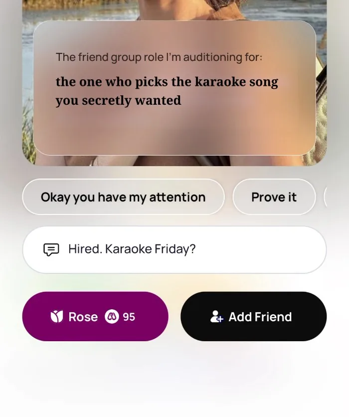 Replying on Alyke to a prompt that says The friend group role I'm auditioning for: the one who picks the karaoke song you secretly wanted, with the comment Hired. Karaoke Friday? typed in and the Rose and Add Friend buttons below