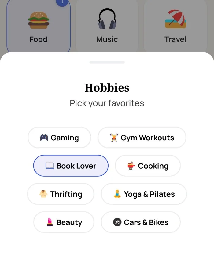 Alyke's interest picker open on the Hobbies category, with Book Lover selected and Gaming, Gym Workouts, Cooking, Thrifting, Yoga & Pilates, Beauty and Cars & Bikes left unselected