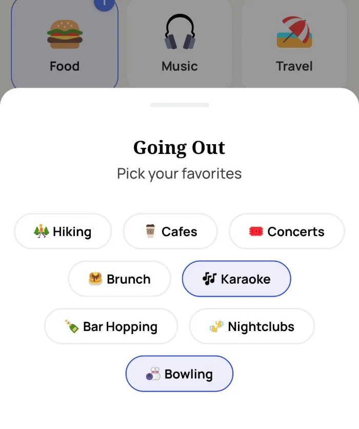 The Alyke interest picker open on the Going Out category, with Karaoke and Bowling selected and Hiking, Cafes, Concerts, Brunch, Bar Hopping and Nightclubs left unselected