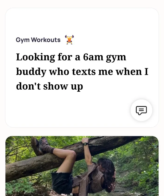 An Alyke profile card for Gym Workouts that reads: Looking for a 6am gym buddy who texts me when I don't show up, above a photo of someone hanging from a fallen tree over a stream