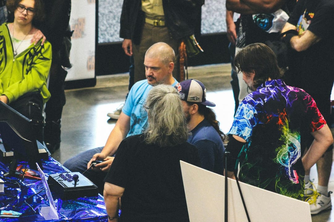 Players and spectators at a weekly fighting game local in a game store