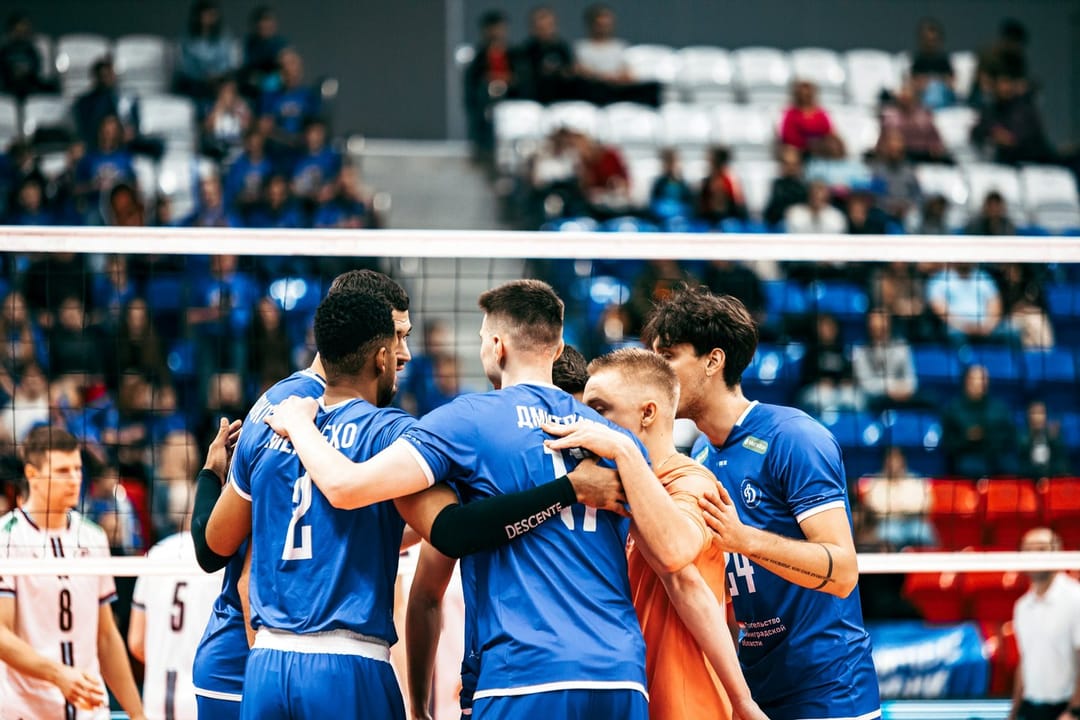A rec league volleyball team celebrating a point
