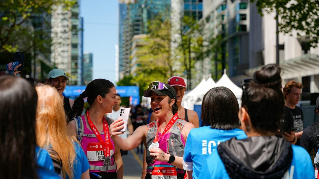 Runners chatting with coffee after a Sunday park race